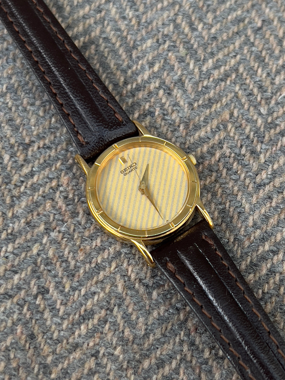Seiko Gold Tone Striped Dial Leather Strap Women's Watch | Product photograph 3