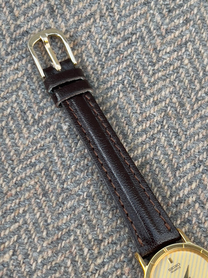 Seiko Gold Tone Striped Dial Leather Strap Women's Watch | Product photograph 4