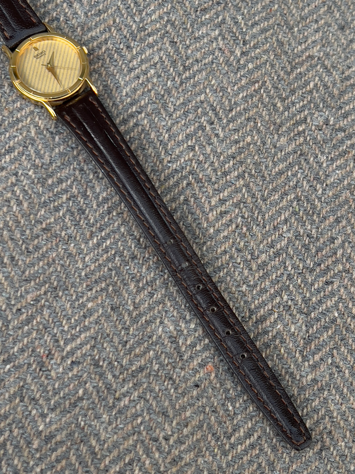 Seiko Gold Tone Striped Dial Leather Strap Women's Watch | Product photograph 5