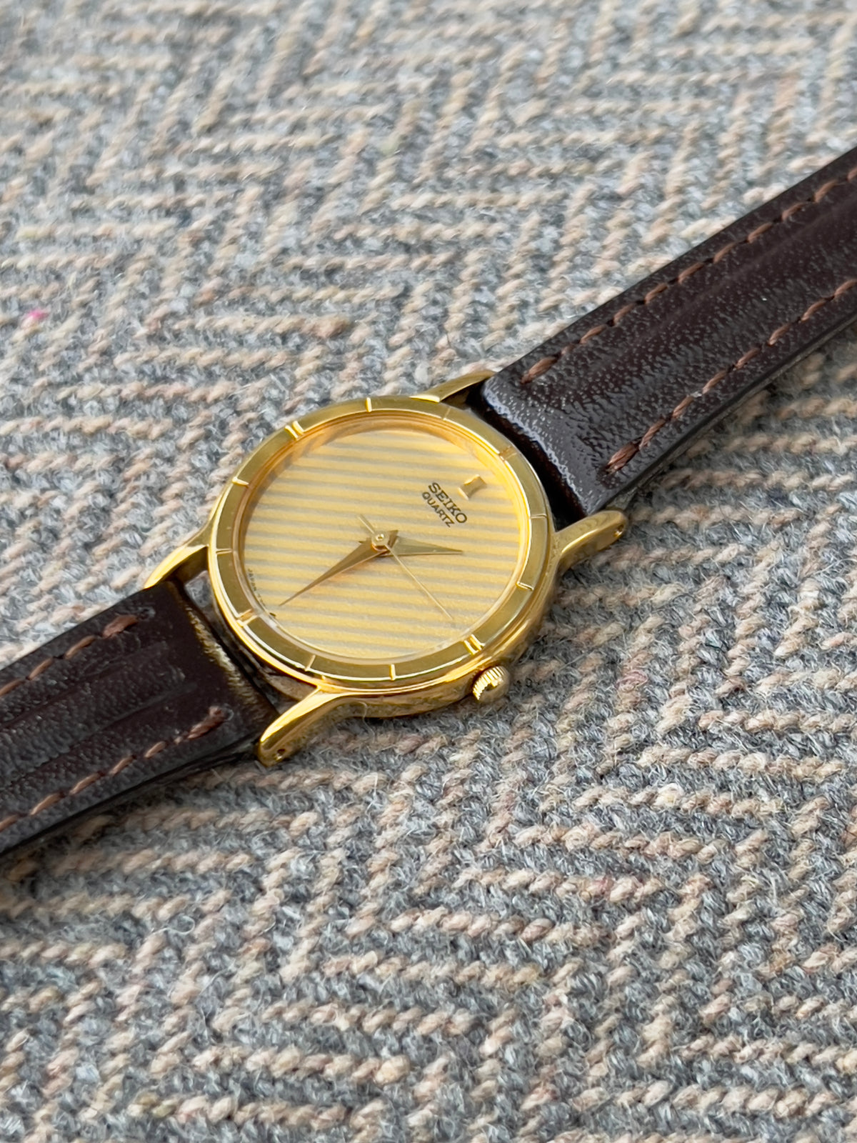 Seiko Gold Tone Striped Dial Leather Strap Women's Watch | Product photograph 7