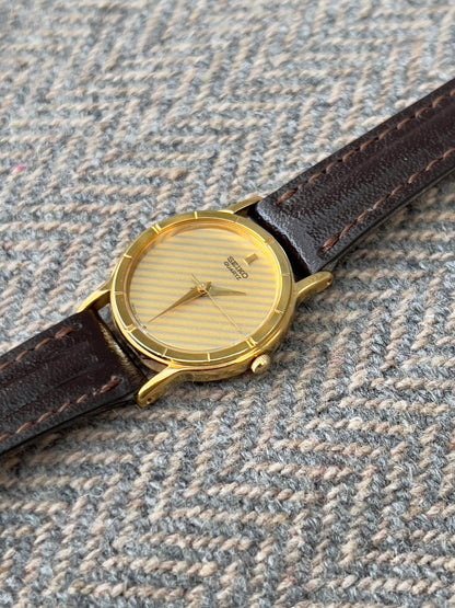 Seiko Gold Tone Striped Dial Leather Strap Women's Watch | Product photograph 7