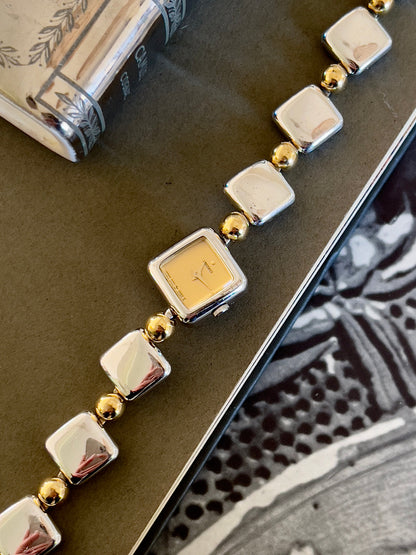Seiko Mini Squares Woman's Watch with Two Toned Bracelet, caseback detail of a vintage women's watch at Gilded Hour.