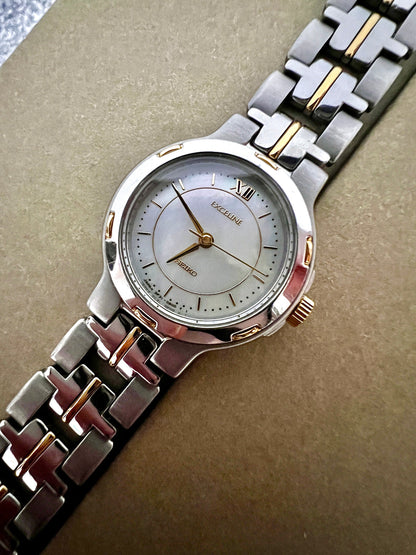 Seiko Exceline Bold Two Tone Woman's Watch with Pearl Dial, caseback detail of a vintage women's watch at Gilded Hour.