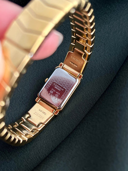Side profile of the Seiko Lassale 1F20-6C70 showing the integrated gold-tone bracelet