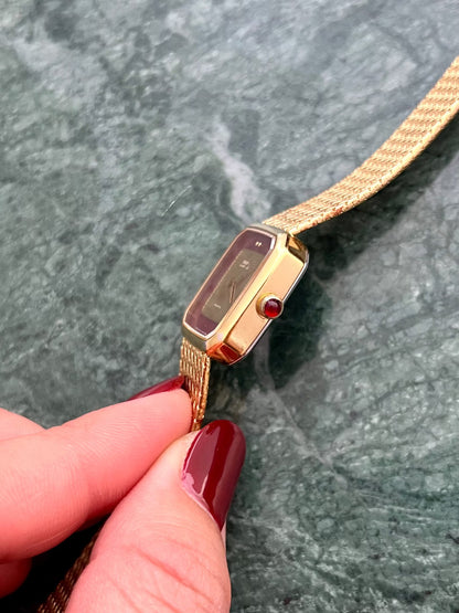 Seiko Lassale Bordeaux Gold Mesh watch — red stone crown side