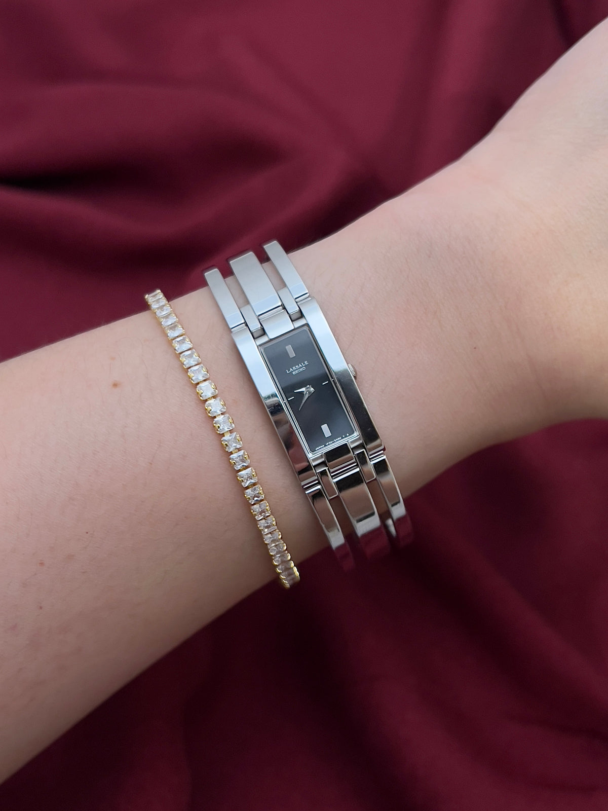 Seiko Lassale Charcoal Dial Silver Bangle Women’s Watch, worn on the wrist.
