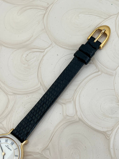 Seiko L'Espoir two-tone Roman dial watch shown on a wrist.