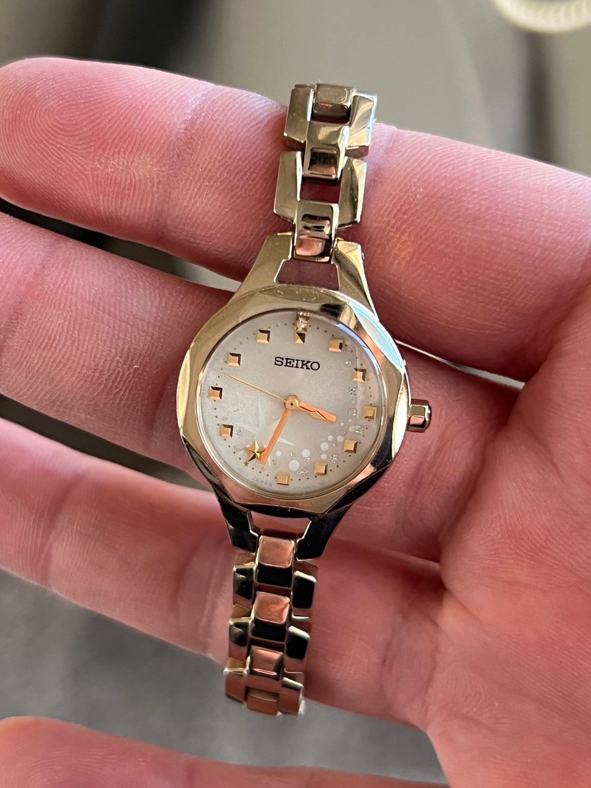 Seiko Limited Edition V117 0AN0 women’s solar watch with celestial star dial and gold tone bracelet