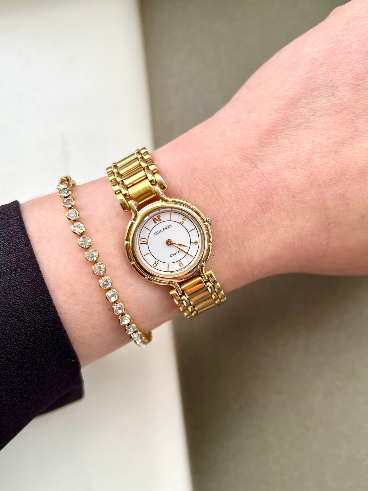 Nina Ricci White Arabic Dial Gold Tone Women's Watch | Product photograph 2