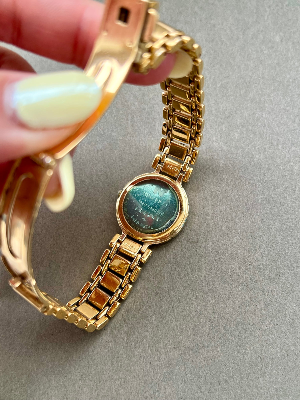 Nina Ricci White Arabic Dial Gold Tone Women's Watch | Product photograph 3