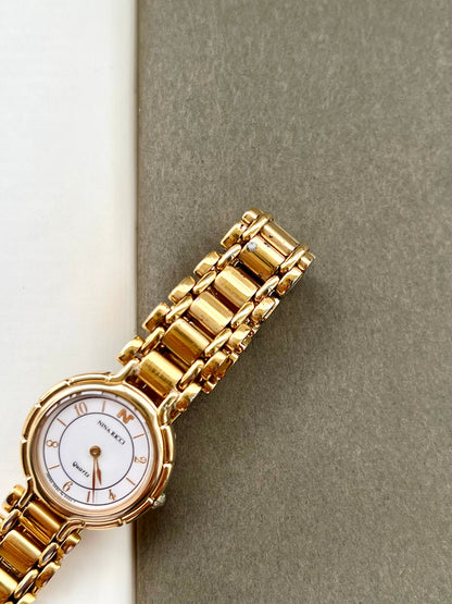 Nina Ricci White Arabic Dial Gold Tone Women's Watch | Product photograph 4