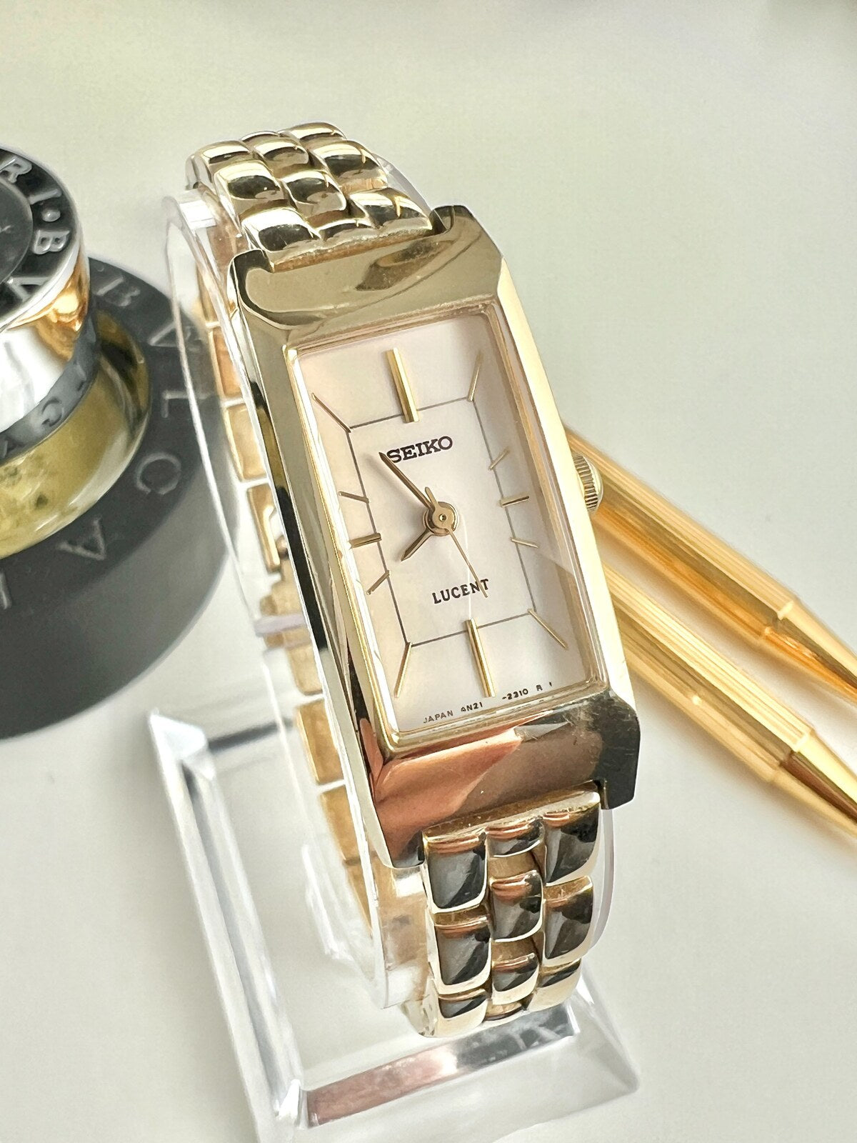 Detailed view of the Seiko Lucent women’s watch with rectangular champagne dial, gold markers and jewellery style bracelet.