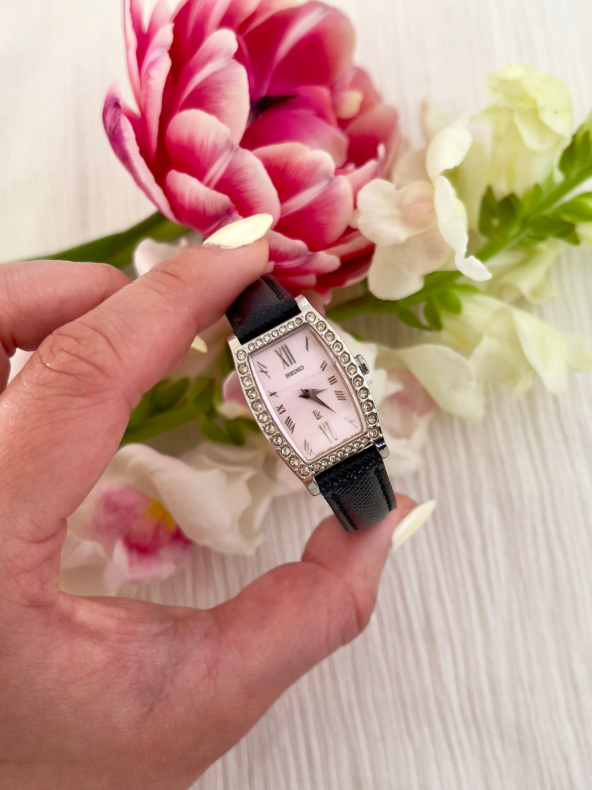 Seiko Lukia Pink Diamond watch — held in hand