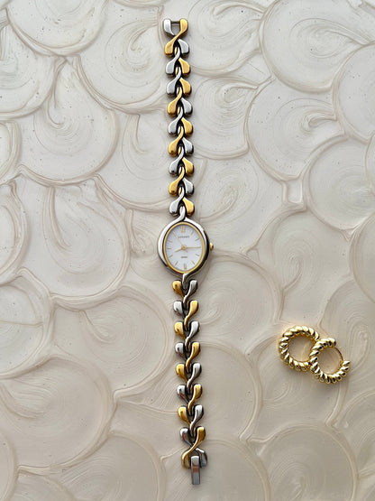 Full-length view of Seiko Lucent women’s watch and two-tone bracelet