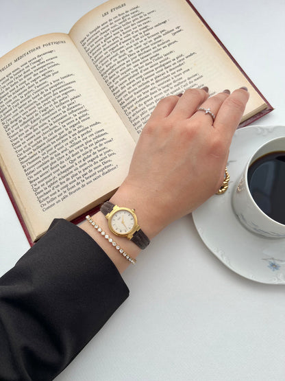 Seiko Gold Toned Sculpted Woman's Watch, product photograph 3.
