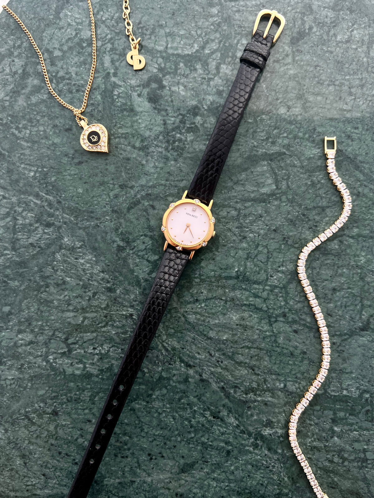 Nina Ricci x Seiko Ladies Gold Watch with Crystal Accents, dial close up of a vintage women's watch at Gilded Hour.