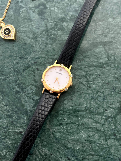 Nina Ricci x Seiko Ladies Gold Watch with Crystal Accents, angled view of a vintage women's watch at Gilded Hour.