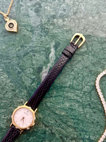 Nina Ricci x Seiko Ladies Gold Watch with Crystal Accents, wrist shot of a vintage women's watch at Gilded Hour.