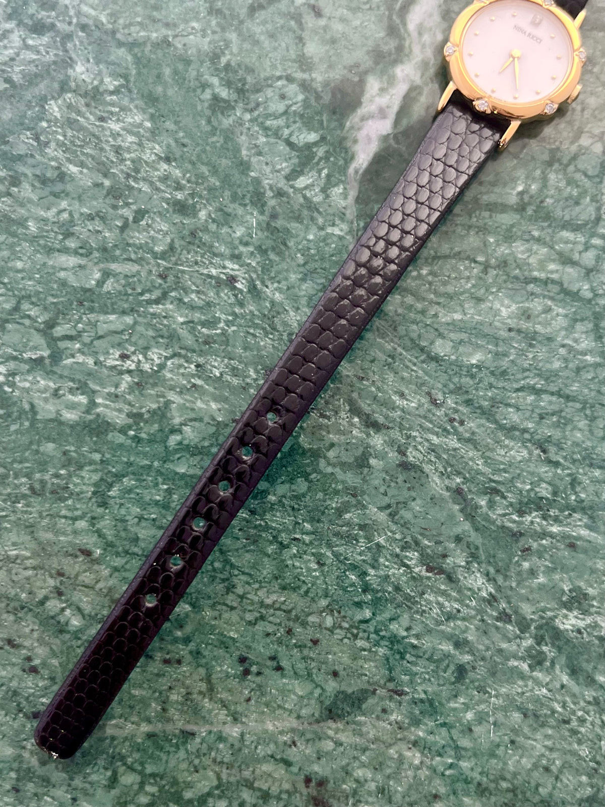 Nina Ricci x Seiko Ladies Gold Watch with Crystal Accents, case profile of a vintage women's watch at Gilded Hour.
