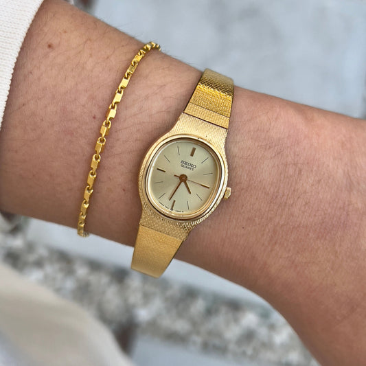 Seiko Oval Gold-Toned Woman's Watch — watch face and case shown from the front.