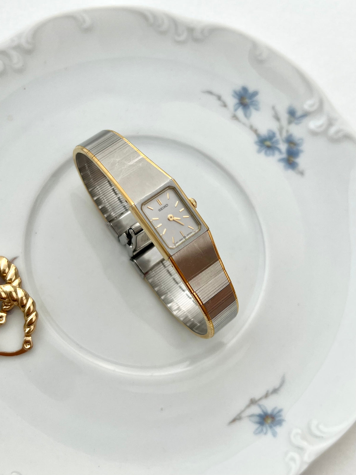 Side profile of the Seiko rectangular case and domed crown.