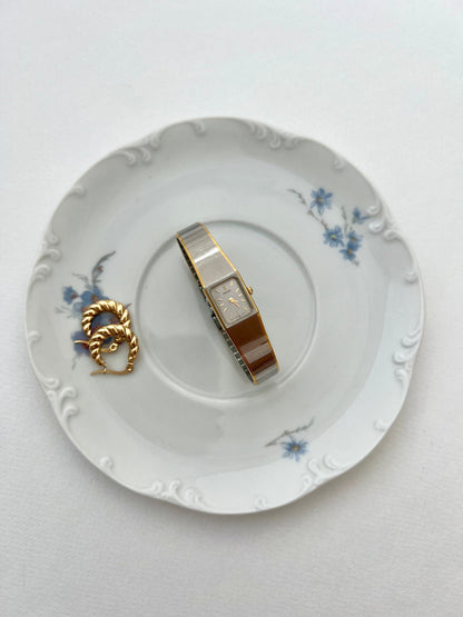 Detail of the Seiko two-tone ribbon-style integrated bracelet.