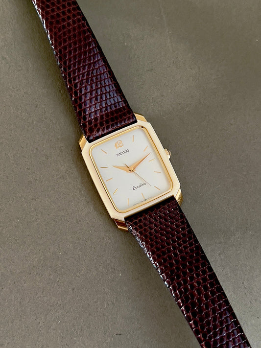 Seiko Two Tone Tank Ceramic Case Woman's Watch, bracelet detail of a vintage women's watch at Gilded Hour.