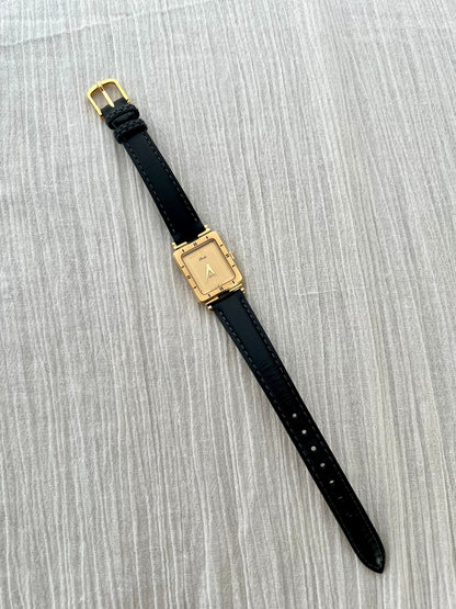 Close-up of the Seiko Porte champagne dial with gold rectangular tracks and hour markers.