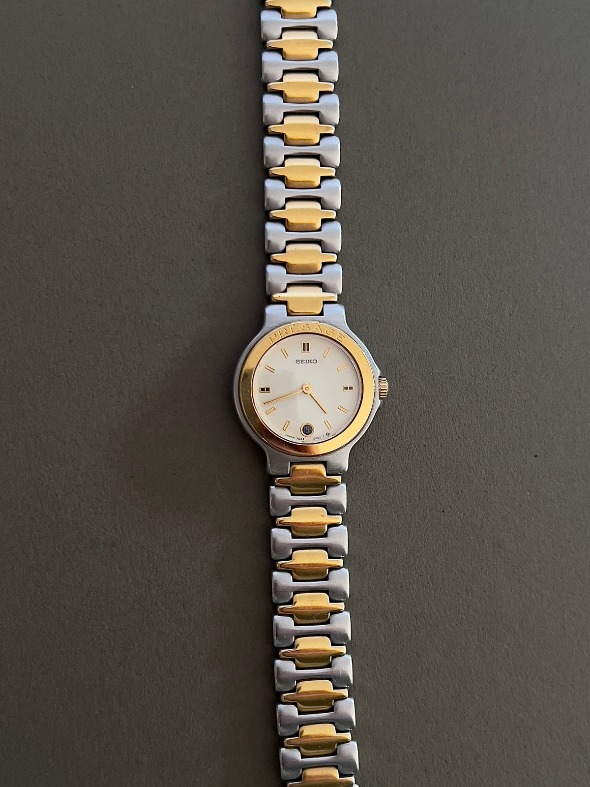 Seiko Presage Date Dial Two Tone Women’s Watch featuring integrated two tone bracelet; vintage watch product image 2.