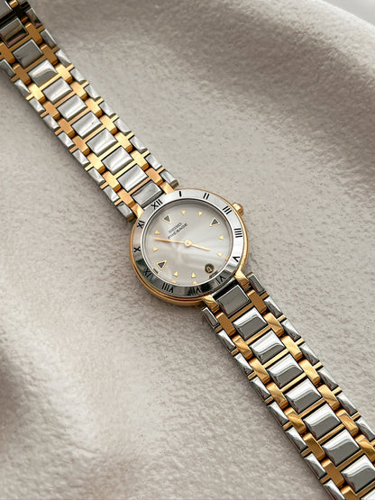 Seiko Presage Roman Bezel Two Tone Women’s Watch featuring silver sunray dial and integrated two tone bracelet; vintage watch product image 2.