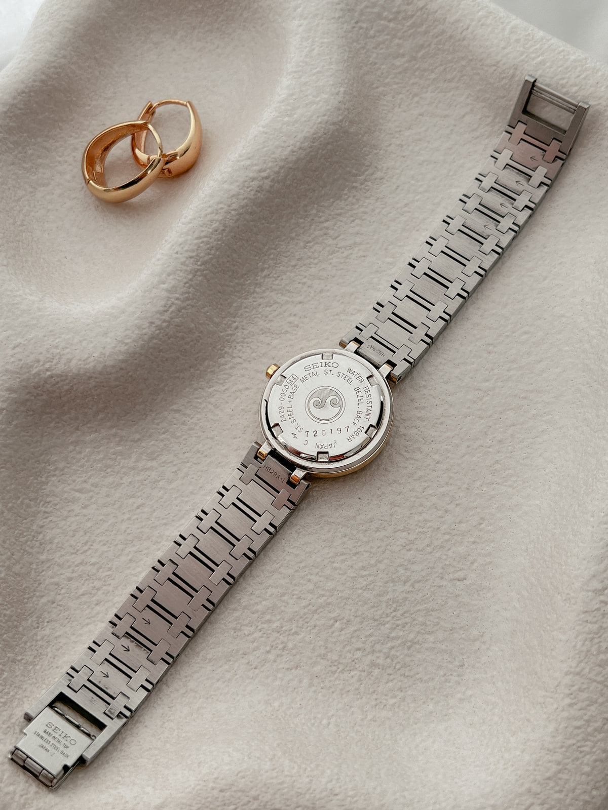 Seiko Presage Roman Bezel Two Tone Women’s Watch featuring silver sunray dial and integrated two tone bracelet; vintage watch product image 4.