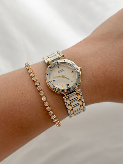 Seiko Presage Roman Bezel Two Tone Women’s Watch featuring silver sunray dial and integrated two tone bracelet; vintage watch product image 5.