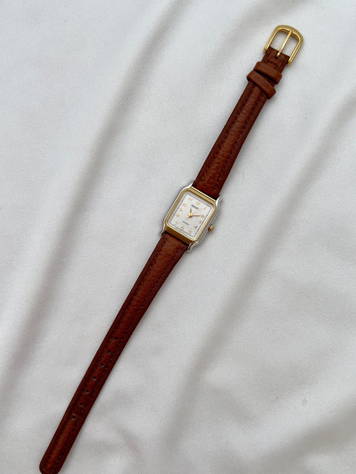 Seiko Exceline Ladies Gold Soft Tank Watch, angled view of a vintage women's watch at Gilded Hour.