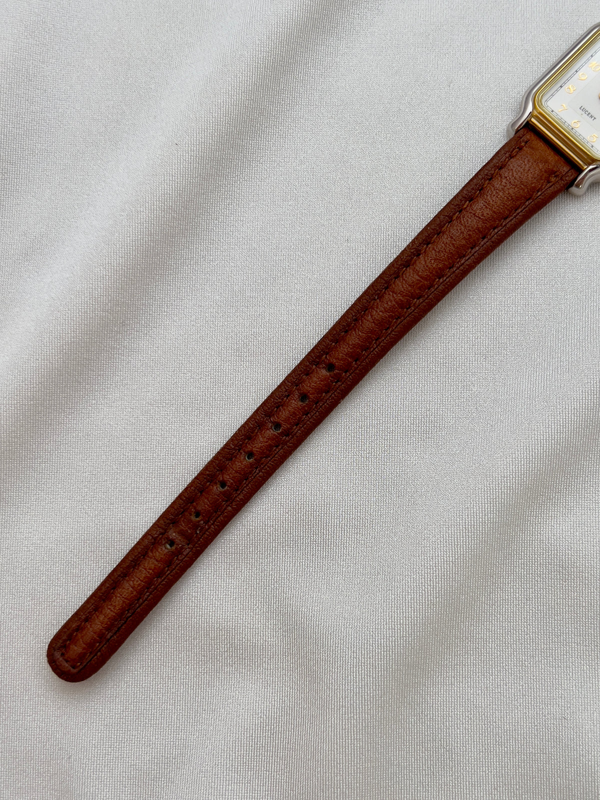 Seiko Exceline Ladies Gold Soft Tank Watch, case profile of a vintage women's watch at Gilded Hour.