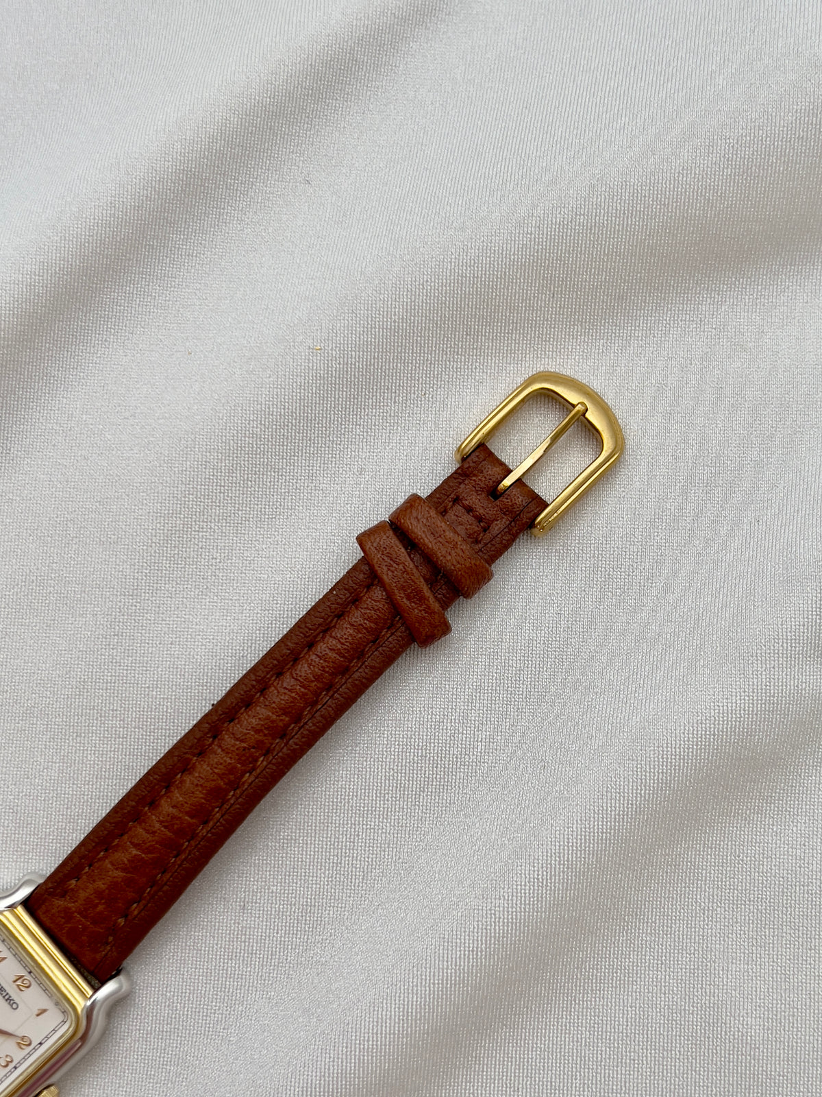 Seiko Exceline Ladies Gold Soft Tank Watch, bracelet detail of a vintage women's watch at Gilded Hour.