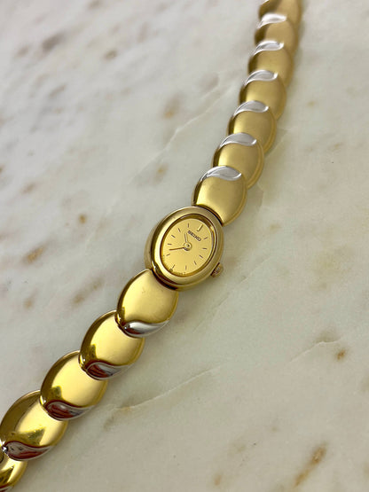 Seiko Tisse Oval Sculpted Two Tone Women's Watch — product photograph 3, Gilded Hour NZ.