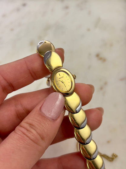 Seiko Tisse Oval Sculpted Two Tone Women's Watch — product photograph 4, Gilded Hour NZ.