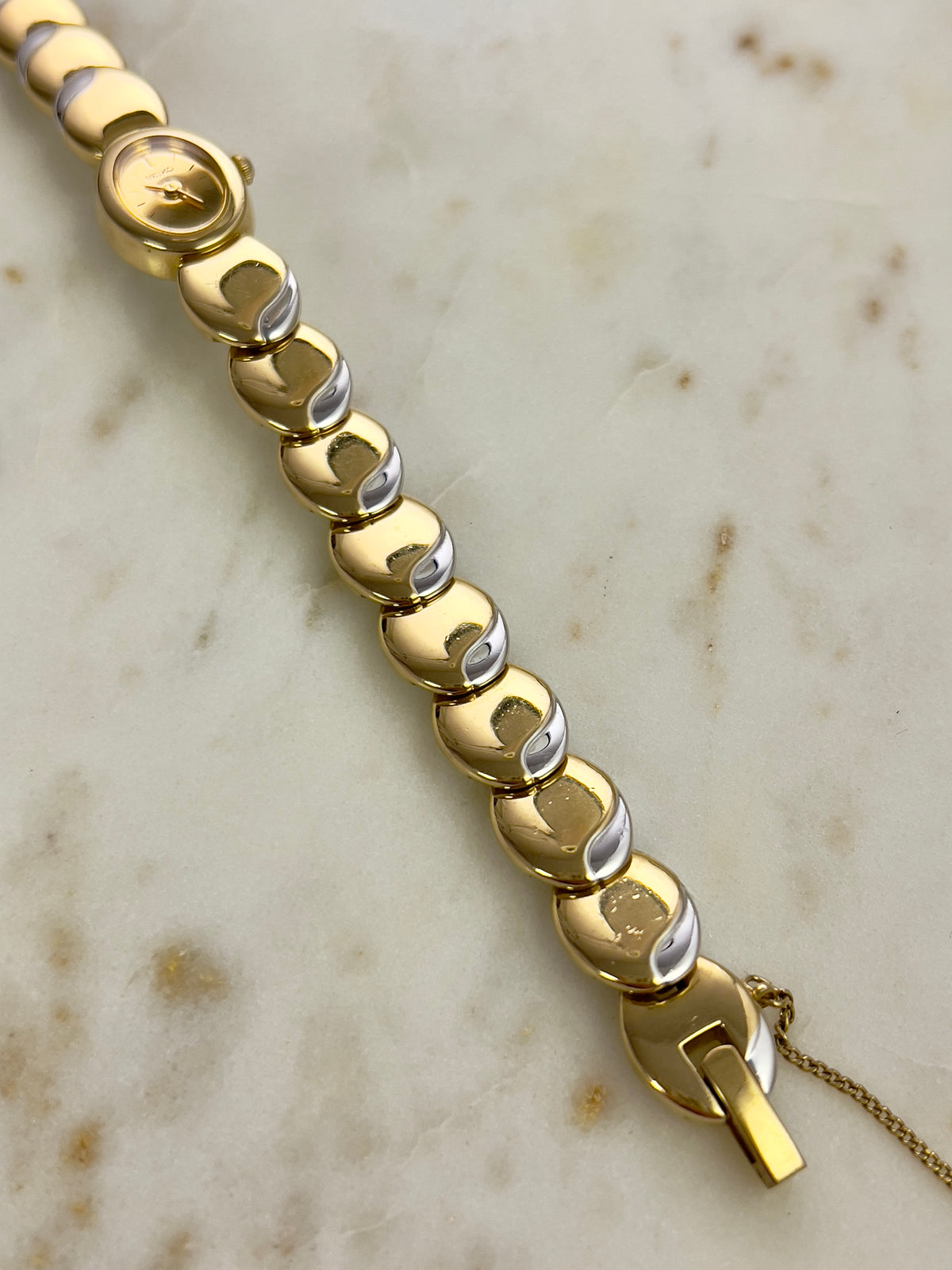 Seiko Tisse Oval Sculpted Two Tone Women's Watch — product photograph 9, Gilded Hour NZ.