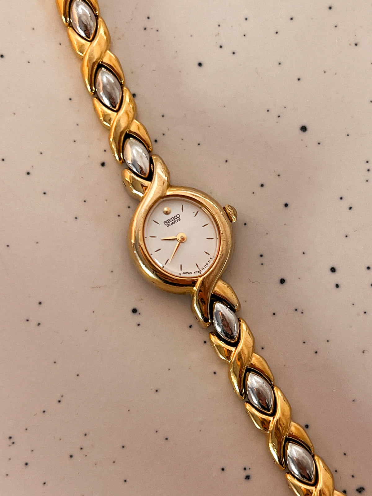 Seiko Oval White Dial Sculpted Two Tone Women's Watch — product photograph 4