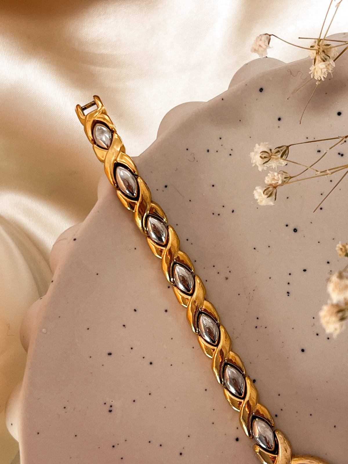 Seiko Oval White Dial Sculpted Two Tone Women's Watch — product photograph 5