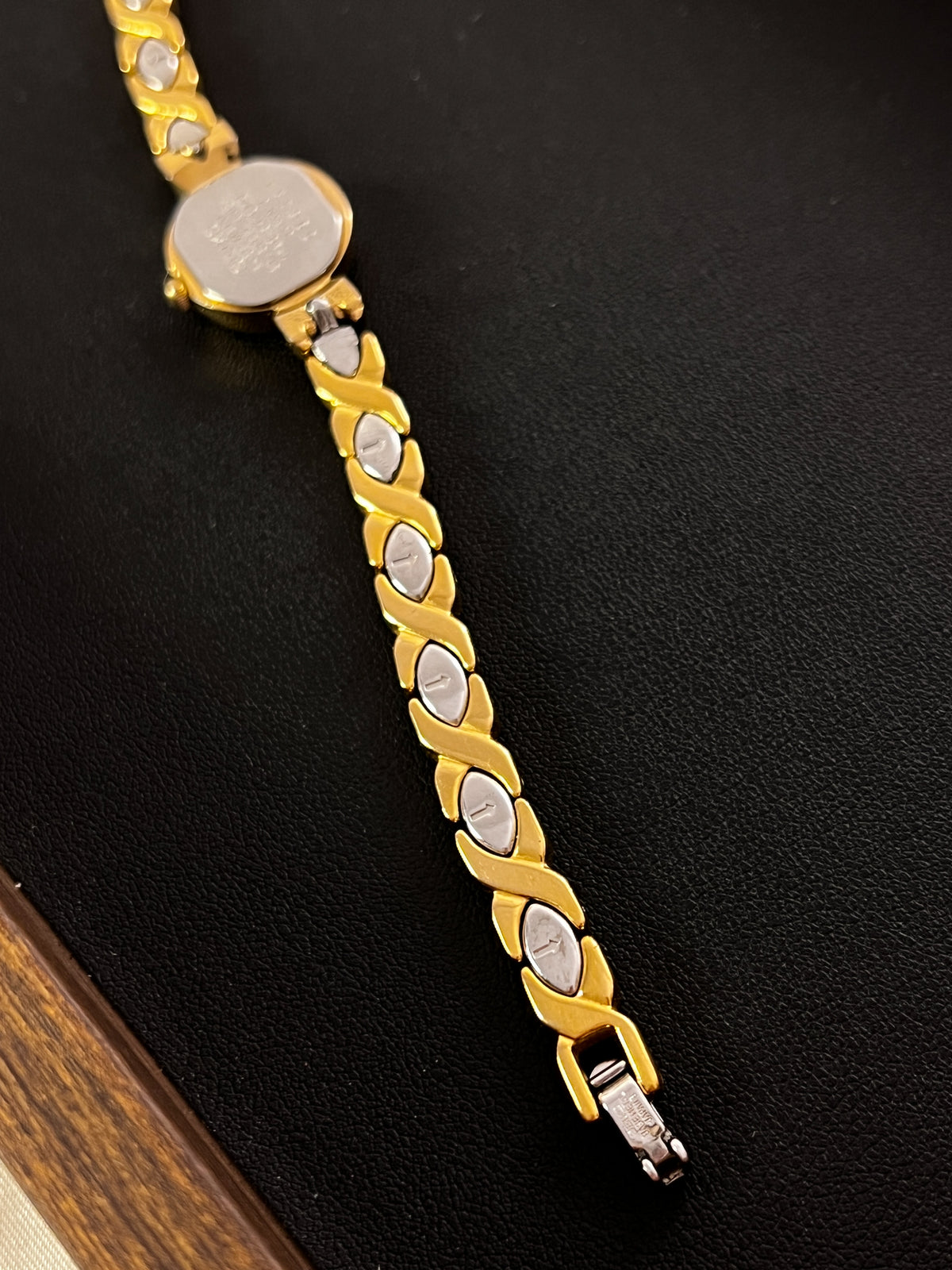 Seiko Oval White Dial Sculpted Two Tone Women's Watch — product photograph 8