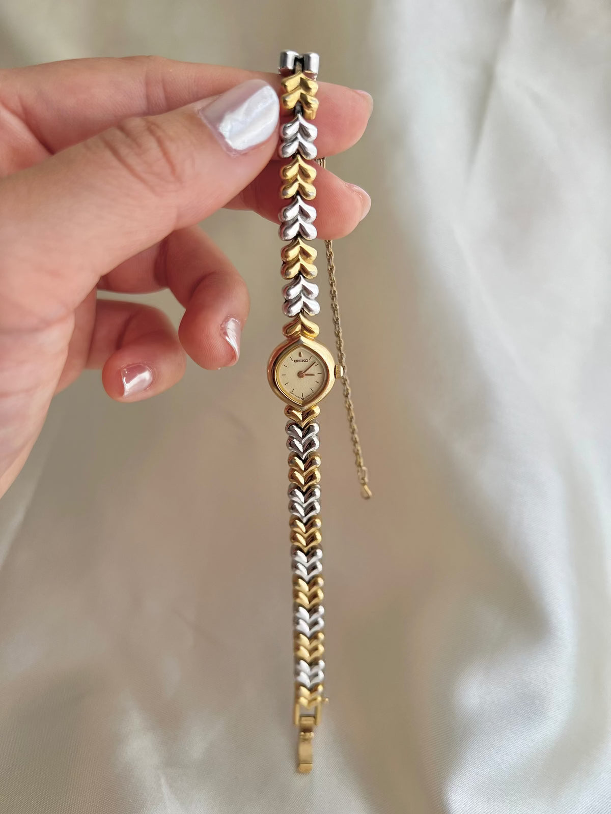 Seiko Champagne Dial Tear Drop Watch with Two-Tone Leaf-Link Bracelet, box set of a vintage women's watch at Gilded Hour.