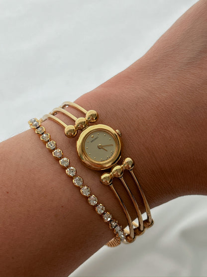 Seiko Tissé Gold Wire Bangle Women’s Watch featuring champagne dial and bangle; vintage watch product image 3.