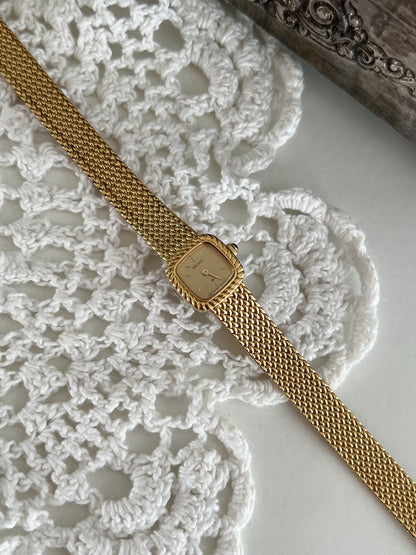 Seiko Tissé Mini Gold Rope Bezel watch — angled front