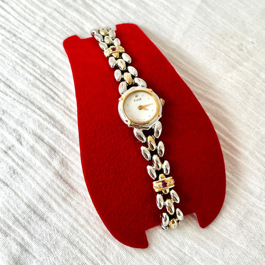 Seiko Tisse Ladies’ Watch with Mother of Pearl Dial & Ruby Accent Bracelet, front view of a vintage women's watch at Gilded Hour.