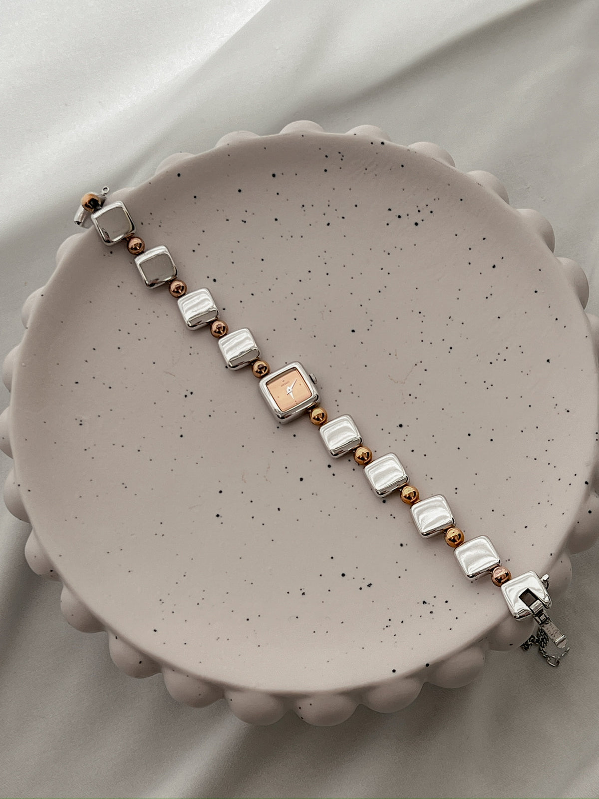Seiko Tissé Peach Dial Two Tone Bracelet Women’s Watch featuring integrated two tone bracelet; vintage watch product image 2.