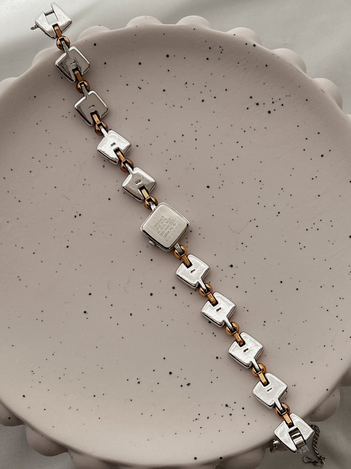 Seiko Tissé Peach Dial Two Tone Bracelet Women’s Watch featuring integrated two tone bracelet; vintage watch product image 3.