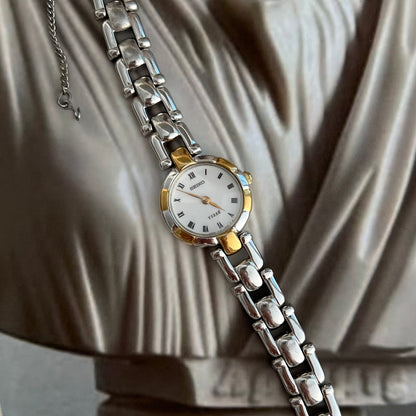 Seiko Tissé Roman Dial Sculpted Two Tone Women’s Watch featuring white dial; vintage watch product image 2.