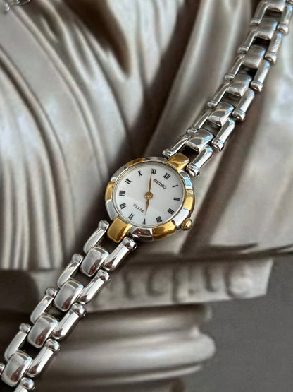 Seiko Tissé Roman Dial Sculpted Two Tone Women’s Watch featuring white dial; vintage watch product image 7.