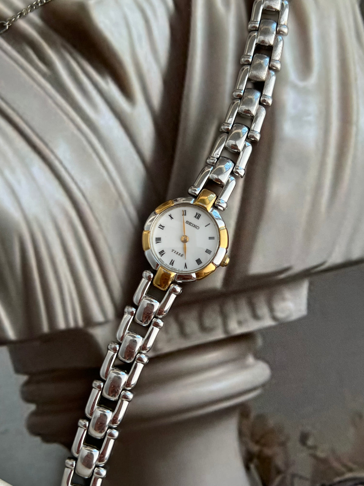 Seiko Tissé Roman Dial Sculpted Two Tone Women’s Watch featuring white dial; vintage watch product image 8.